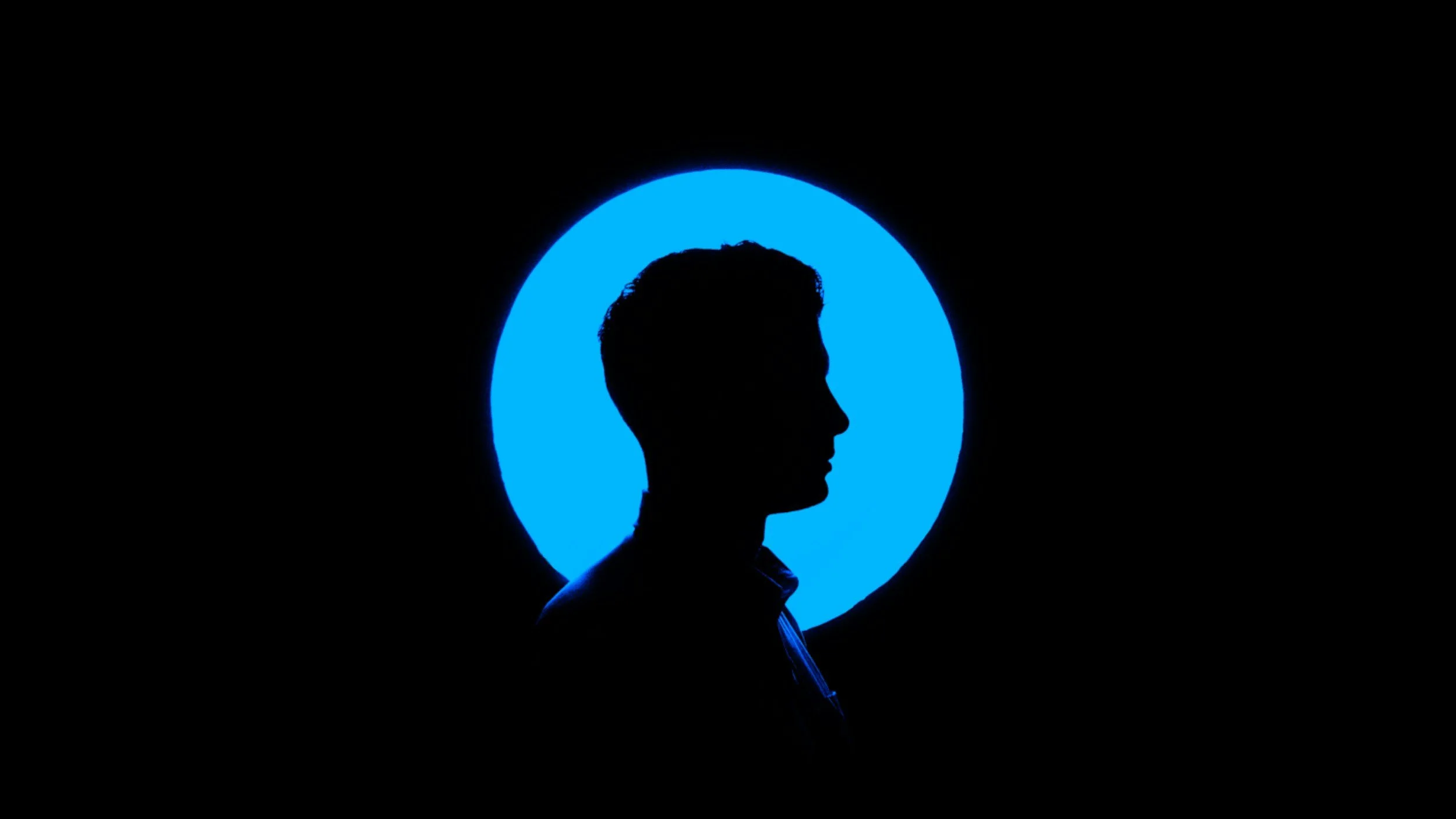 Blue-lit silhouette for Purpose Tutoring article about AI in education