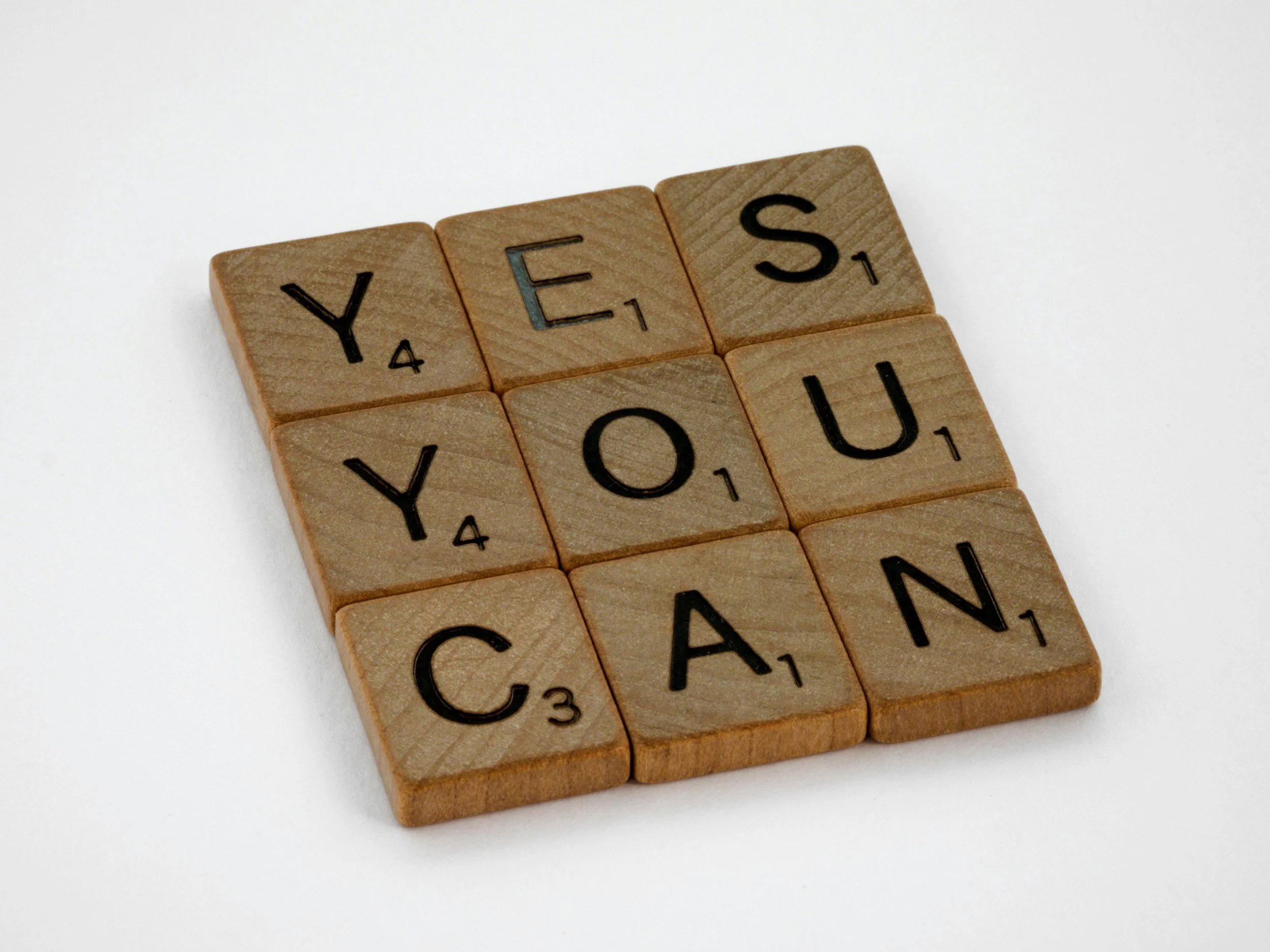 Wooden letter tiles spelling yes you can for Purpose Tutoring motivation article